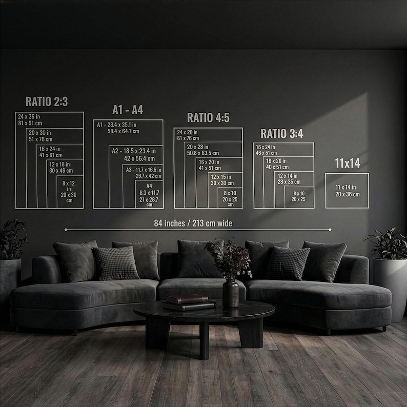 May include: A dark gray living room with a sectional sofa, coffee table, and wall art. The wall art displays size ratios and dimensions in inches and centimeters. The text on the wall reads "RATIO 2:3", "A1-A4", "RATIO 4:5", "RATIO 3:4", and "11x14". The text also reads "84 inches / 213 cm wide".