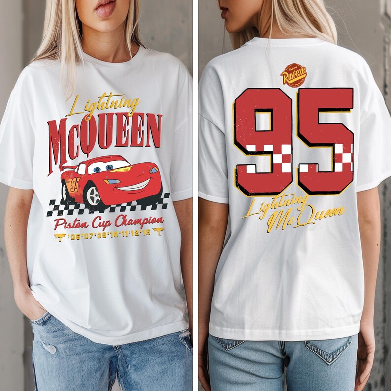May include: White t-shirt featuring Lightning McQueen from the movie Cars. The front graphic includes the character, text "Lightning McQueen", and "Piston Cup Champion". The back displays a large "95" and "Lightning McQueen" in red and yellow.