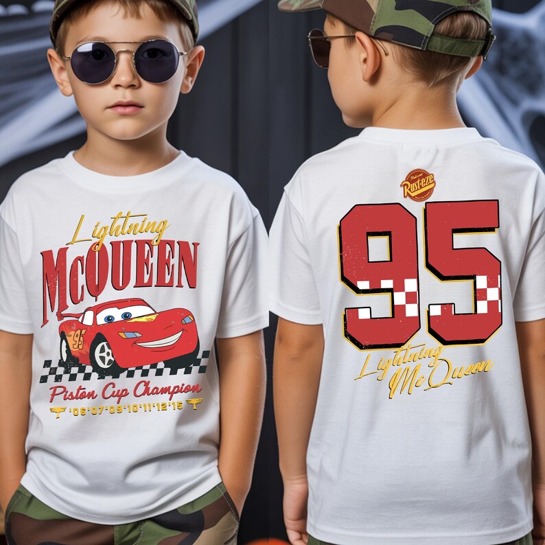 May include: White t-shirt featuring Lightning McQueen from the Cars movie. The front displays the character's name and image, along with "Piston Cup Champion." The back shows the number "95" in red with a checkered pattern.