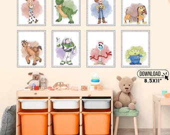 May include: Eight framed art prints featuring characters from a popular animated film. The prints are displayed on a light beige wall. Below the prints is a wooden storage unit with orange and white storage bins. A small green stool with a teddy bear is in front of the unit.