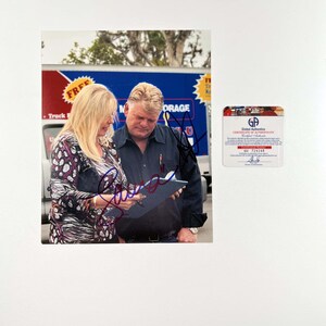 Storage Wars Cast Dan and Laura Dotson 8x10 Inch Photo Signed Autographed Authentic