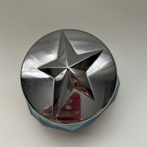 Empty Thierry Mugler Angel collection cream pot.