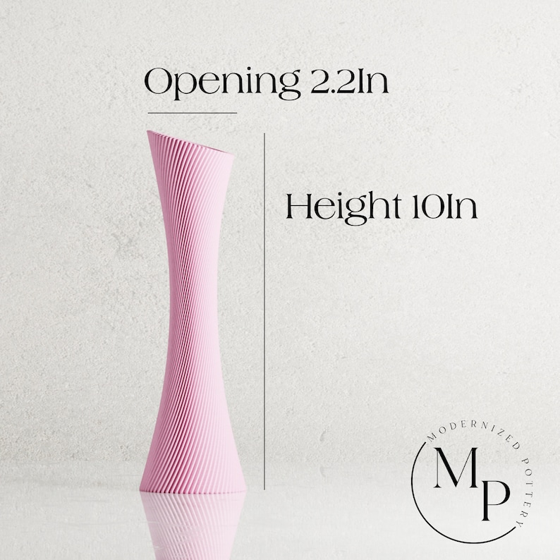 May include: A pink ceramic vase with a textured, swirling design. The vase is 10 inches tall and has a 2.2 inch opening.  The vase is made by Modernized Pottery.