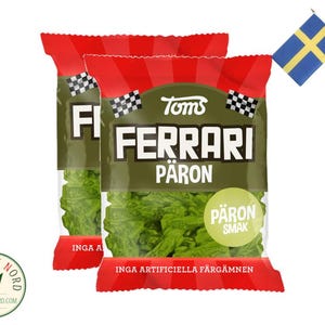 May include: Two bags of green candy with the words "Toms Ferrari Pärön" and "Pärön Smak" on the front. The bags are red and green with a checkered flag design.