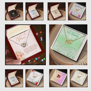 May include: A set of 10 gift boxes with necklaces inside. Each box has a different design and message. The necklaces feature two interlocking hearts. The boxes are all red with a white interior. The necklaces are gold and silver.