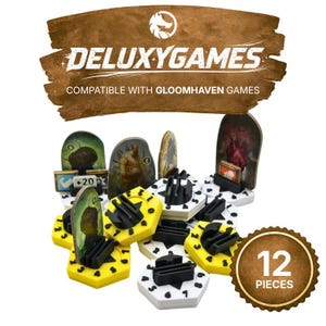 May include: A collection of board game accessories, including yellow and black hexagonal pieces, and various character standees. The image features the text "DELUXYGAMES" and "COMPATIBLE WITH GLOOMHAVEN GAMES". A brown circular label indicates "12 PIECES".