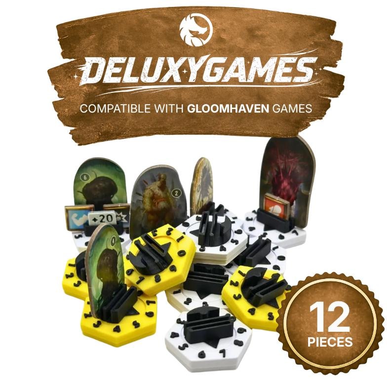 May include: A collection of board game accessories, including yellow and black hexagonal pieces, and various character standees. The image features the text "DELUXYGAMES" and "COMPATIBLE WITH GLOOMHAVEN GAMES". A brown circular label indicates "12 PIECES".