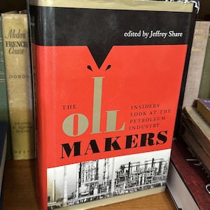 May include: A hardcover book titled "The Oil Makers" with a red cover and black spine. The title is in large white letters. The book is edited by Jeffrey Share and discusses the petroleum industry.