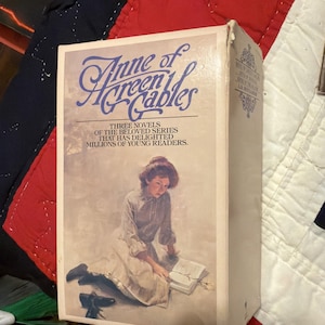 May include: A set of three ceramic mugs with a speckled, matte finish. The mugs are in shades of cream, light gray, and dark gray. Each mug has a simple, minimalist design and a rounded handle.