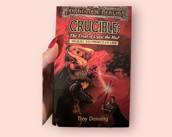 Romanzo fantasy Crucible, Magia oscura e missione eroica (edizione brossura)