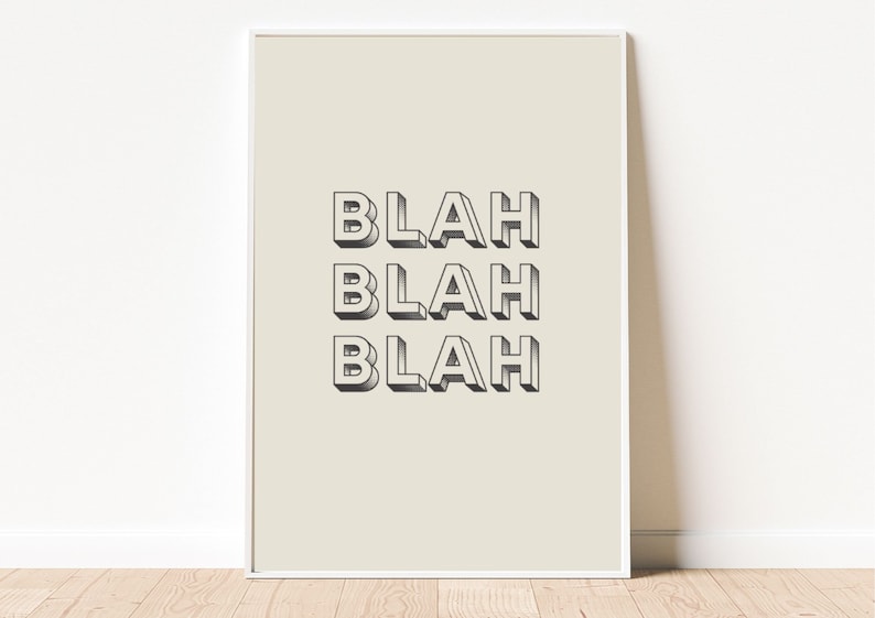 May include: A beige poster with the word "Blah" repeated three times in a 3D style font.