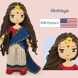 May include: Crochet pattern for a doll wearing a blue and white sari with a red top and gold jewellery. The doll has brown hair and a red dot on her forehead. The pattern is called "Akshaya" and is available as a PDF download.