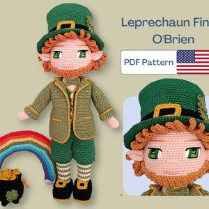 May include: A crocheted leprechaun doll in a green outfit, including a hat, jacket, and shorts. The doll has orange hair and a beard, with a rainbow and pot of gold. The image includes the text "Leprechaun Finley O'Brien PDF Pattern".