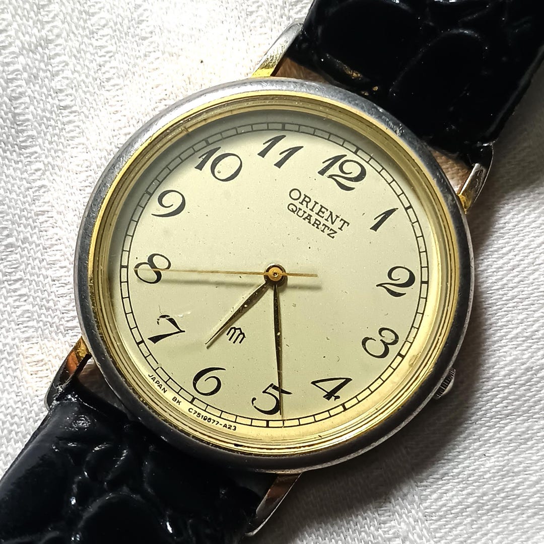 Vintage Orient Quartz Watch, Gold Plated Oval Case, Black Leather