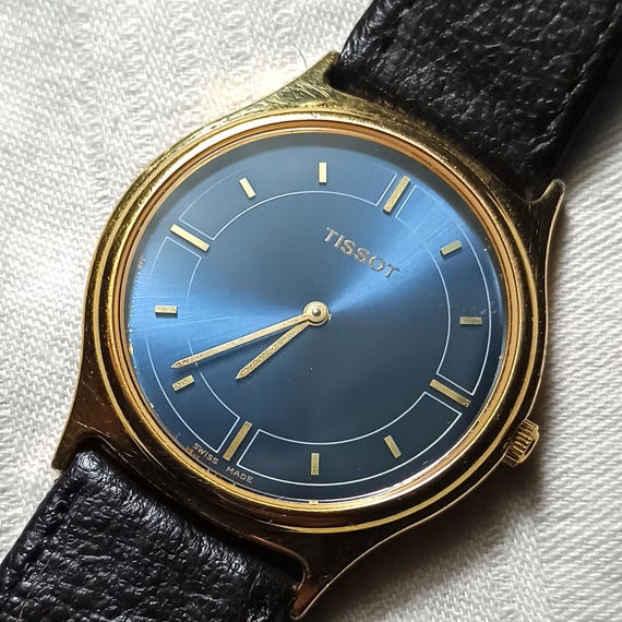 Vintage Tissot F380K Watch: 1990s Gold Tone Blue Dial Sapphire