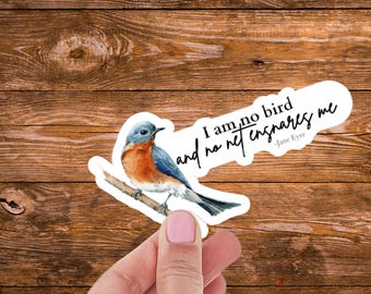 May include: A sticker featuring a watercolor illustration of a bluebird perched on a branch. The sticker includes the quote "I am no bird and no net ensnares me" from Jane Eyre.