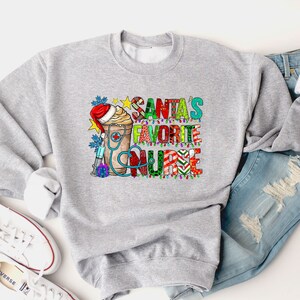 Santas Favorite Nurse sweatshirt, Christmas Nurse sweatshirt, Nursing sweatshirts for Woman, Nurse Christmas Gift, Favorite Nurse sweatshirt