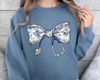 Comfort Colors® Nurse Coquette Sweatshirt, Nurse Toile Bow Sweatshirt, Nurse Appreciation, Stethoscope Bow Hoodie, Nurse Graduation Sweater