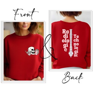May include: Red sweatshirt with a skull holding a coffee cup on the front and the text "Radiologist" spelled vertically with a spine graphic on the back.