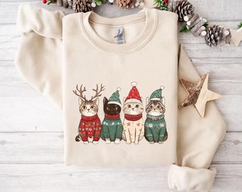 かわいい猫のクリスマススウェットシャツ、猫好きのクリスマスギフト、クリスマススウェットシャツ、ホリデースウェットシャツ、冬用スウェットシャツ、クリスマスクルーネック、猫パーカー
