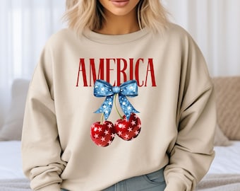 Coquette America Cherries Sweatshirt, 4th Of July Sweatshirt, Coquette Bow Cherry Sweater, Patriotic Cherry Bow Sweatshirt, America Hoodie