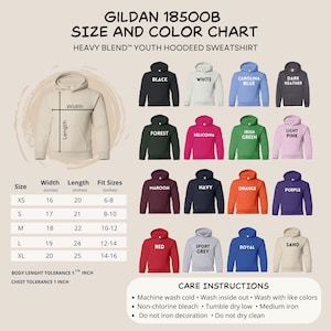 May include: Gildan 18500B size and color chart for youth hooded sweatshirts. Includes a beige hoodie diagram with width and length labels, a table of sizes XS to XL in inches, and sixteen color swatches labeled black, white, blue, grey, green, pink, maroon, navy, orange, purple, red, and sand.