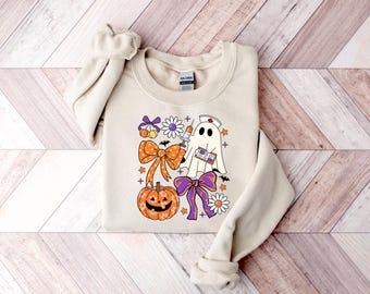 Nurse Halloween Coquette Sweatshirt, Nurse Sweatshirt, Ghost Nurse Sweatshirt, Spooky Nurse Shirt, ER Nurse Sweatshirt, Nurse Halloween Gift