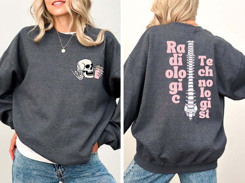 May include: A dark gray sweatshirt with a pink skeleton holding a coffee cup on the front and the words "Radiologic Technologist" spelled vertically down the spine on the back.