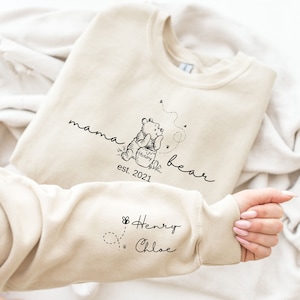 Personalized Mama Bear Sweatshirt, Mama Est With Kid Name On Sleeve Sweater, Custom Mama Bear Winnie The Pooh Sweatshirt, Mothers Day Gift
