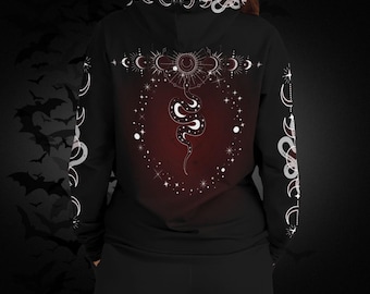 May include: Black hoodie with a celestial design featuring a snake, moons, and stars. The back of the hoodie has a red gradient background with a white snake in the center. White celestial designs are also on the hood and sleeves.
