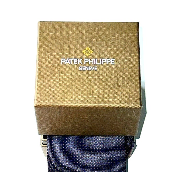 Gents new in box Patek Philippe silk tie , 2018 Collection shimmering blue fine red dot pattern . stunning