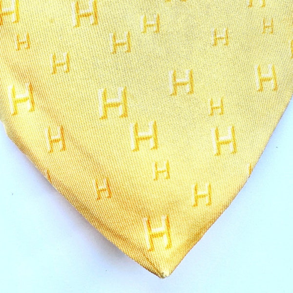 Gents Vintage Hermes Paris Silk Tie 5283ie, pre owned used in a good condition no stains slight miss shaped at point