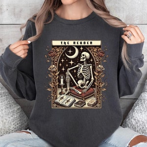 Comfort Colors® The Reader Tarot Card Sweatshirt, Skeleton Reading Shirt, Unisex Tarot Card Shirt, Book Lover Gift, Bookish Gift, Book Shirt