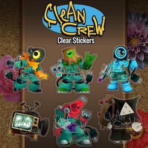 May include: A set of six clear stickers featuring stylized characters and a television set with the text Clean Crew Clear Stickers. The characters include figures with mechanical parts, electrical plugs, and vibrant colors like teal, orange, red, and black.