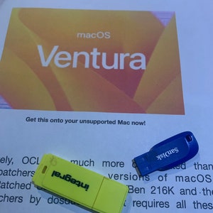 May include: A yellow USB stick with the text "Install" printed on it, next to a blue USB stick with the text "Sandisk" printed on it. The sticks are on a white surface with text that reads "Ventura OCLP for Unsupported Macs Supplied by Mac Renewal Ltd macOS Ventura Get this onto your unsupported Mac now! ely, OCL much more ed than versions of macOS Ben 216K and the requires all thes USB stick will install macOS Ventura on"