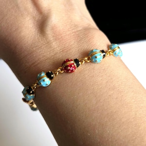 May include: A distressed wooden sign, inscribed with "Welcome to our home" in white. The sign has a rustic finish, ideal for a porch or hallway, creating a welcoming atmosphere.