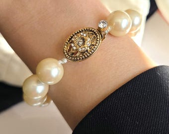 Vintage Monet Large Faux Pearl Bracelet Rhinestone Clasp Gold Tone Elegant editorial jewelry