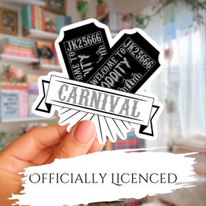 May include: A black and white sticker featuring two crossed carnival tickets with the text JK25666 and Welcome to Oddity, layered with a white banner displaying the word CARNIVAL in bold black letters, all set against a blurred background.