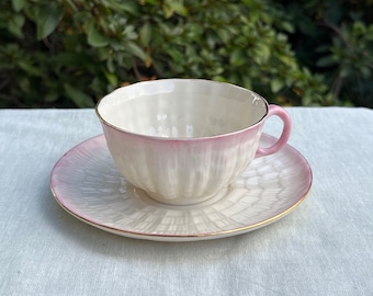 Rare Vintage Belleek Pink Tridacna tea cup and saucer, like new condition with original tag