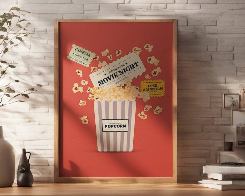 K&ouml;nnte beinhalten: Ein rotes Poster mit einem wei&szlig;en, gestreiften Popcorn-Eimer und verstreuten Popcorn-Kernen. Das Poster zeigt auch Tickets mit dem Text "Kino", "Eintritt f&uuml;r den Filmabend" und "Freier Eintritt".