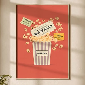 K&ouml;nnte beinhalten: Ein rotes Poster mit einem Popcorn-Eimer und Kinokarten. Die Karten zeigen "Eintritt f&uuml;r Kinoabend" und "Freier Eintritt". Der Popcorn-Eimer ist wei&szlig; mit lila Streifen und tr&auml;gt die Aufschrift "Popcorn".