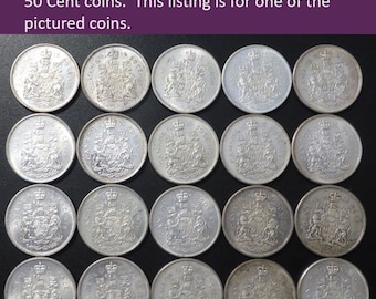 May include: A collection of 18 silver Canadian 50 cent coins from 1965 featuring Queen Elizabeth II. The coins are arranged in a grid pattern on a dark surface. Lot#222: 1965 Canadian Queen Elizabeth II 50 Cent coins. This listing is for one of the pictured coins.