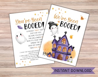 May include: Two printable Halloween "You've Been Booed!" signs with a ghost and a haunted house. The signs include instructions for a Halloween booing game.