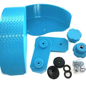 May include: A collection of light blue 3D-printed parts, including a curved piece, a textured band, two hinged pieces, two knobs, washers, and screws. The parts are arranged on a white surface, suggesting a DIY or repair kit.