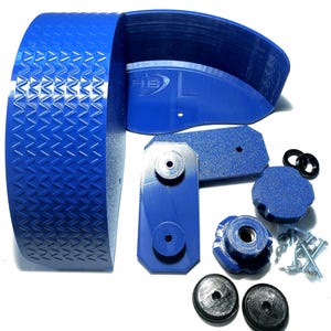 May include: A collection of blue 3D-printed parts, including a curved piece with a textured surface, several rectangular pieces, and various fasteners. The parts are arranged on a white surface.