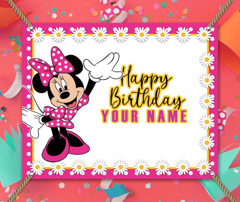 May include: A pink and white birthday banner featuring Minnie Mouse. The banner has a white background with a daisy border and the words "Happy Birthday YOUR NAME" in yellow and pink. Minnie Mouse is wearing a pink polka dot dress and bow.