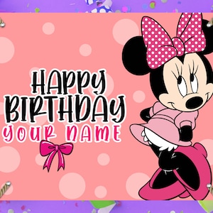 May include: A pink birthday banner featuring Minnie Mouse. The banner has the text "Happy Birthday Your Name" in black and pink. Minnie Mouse is wearing a pink dress and a polka dot bow.