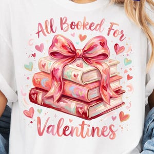 May include: White t-shirt with a watercolor design featuring a stack of books tied with a pink bow, hearts, and the text "All Booked For Valentines." The words "Digital Design Only" are also visible.