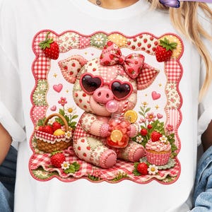 May include: White t-shirt featuring a whimsical pig design. The pig, wearing heart-shaped sunglasses and a bow, is surrounded by strawberries and a basket. The text "Digital Design Only" is at the bottom. Includes 8 free designs.