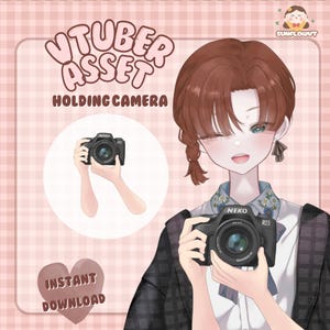 May include: Digital illustration of a VTuber asset holding a camera. The image features a cartoon character with brown hair and a black camera. Text on the image reads "VTuber Asset Holding Camera" and "Instant Download".